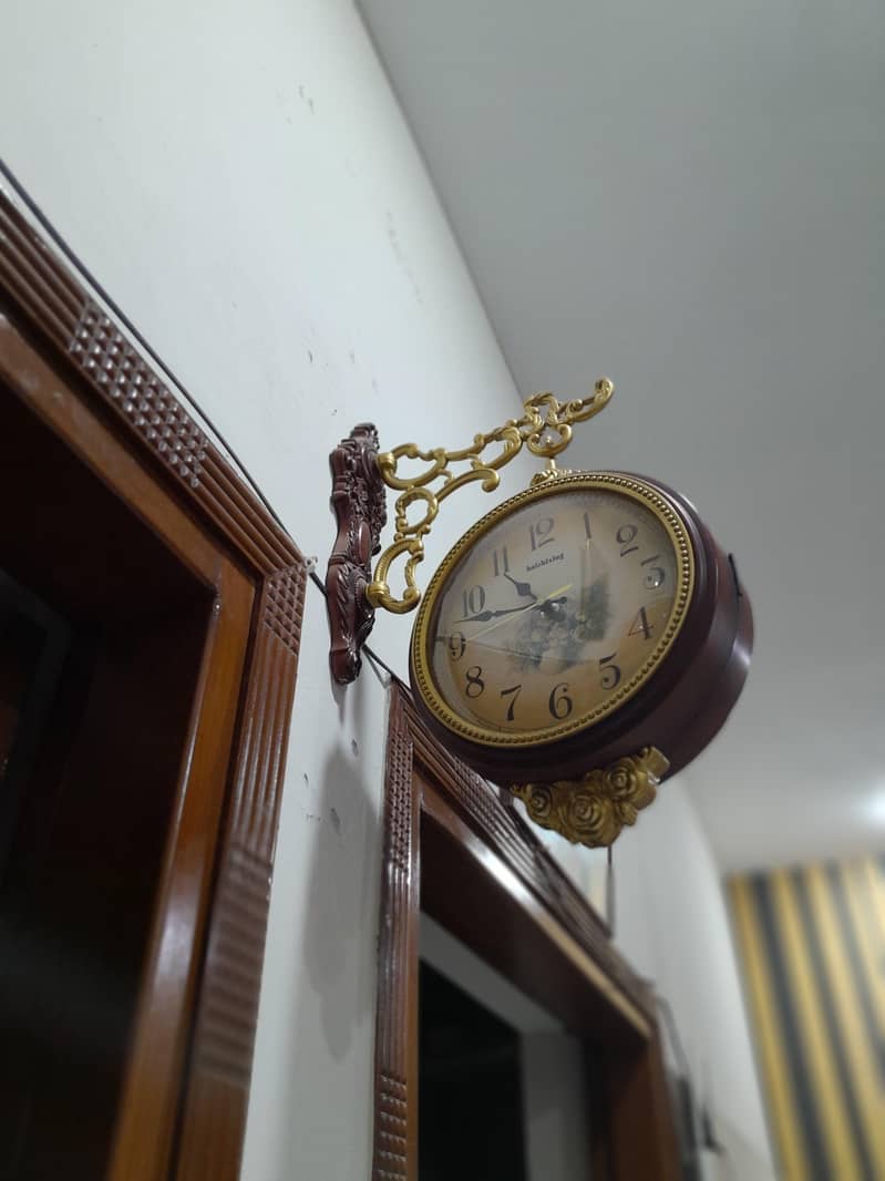 2 sided Wall clock 0