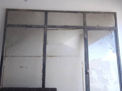 shop gate frame mirror 9 by 10 ft 1ft mirror broke and all ok