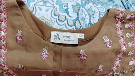 organza 3pice dresses 1 time use han 2no dresses boaht achi condition
