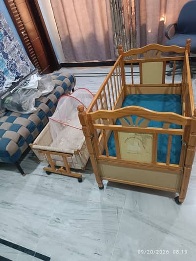 Baby wooden cot plus bed.