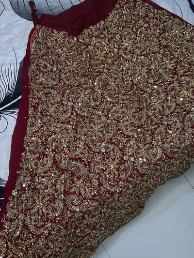 bridal lehnga with jewellery and potli