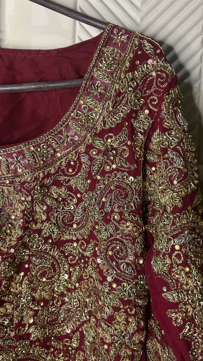 bridal lehnga with jewellery and potli
