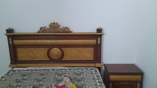 bed with side table