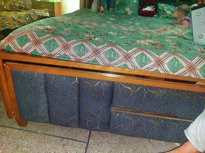 bed with two side tables