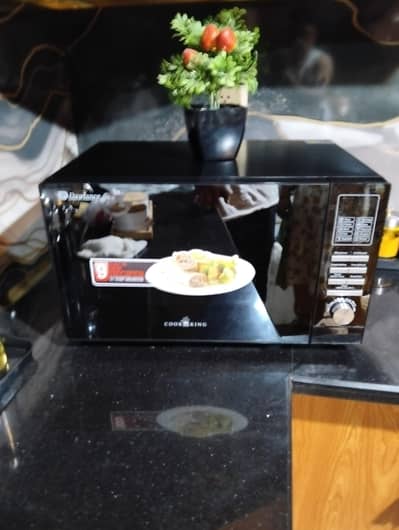 Title: Dawlance Microwave Oven (DW-128-G) – Slightly Used, Perfect