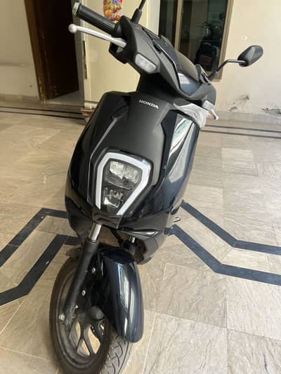 Honda scooty icon e 2026
