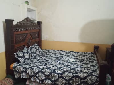 Used bed and dressing table with mirror for sale.