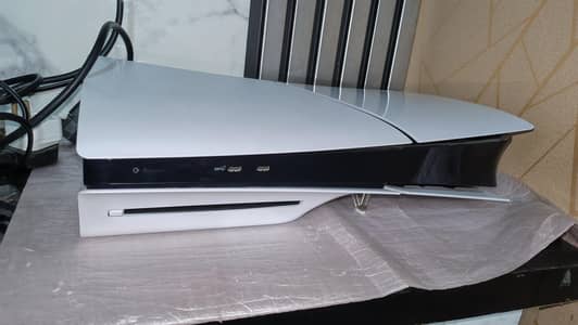 ps5 slim with games and controllers