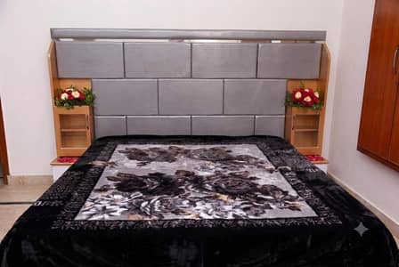 Luxury Bedroom Set - Modern Bed with Attached Sidetables and settee.
