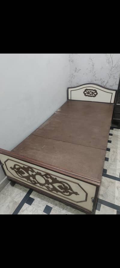 solid Single Wooden Bed – Good Condition