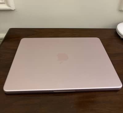 MacBook Neo, in Blush pink colour.