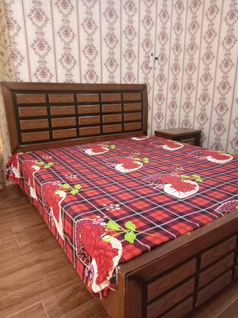 solid king size bed without matress. 1
