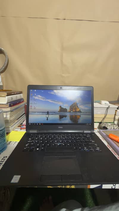 Dell laptop in good condition just back little rough due to sticker.