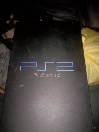 Sony PlayStation 2 (PS2) + 2 Controllers – Used