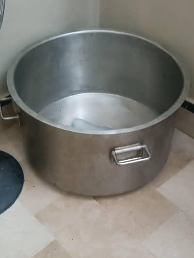 large cooking vessel.  bhagona