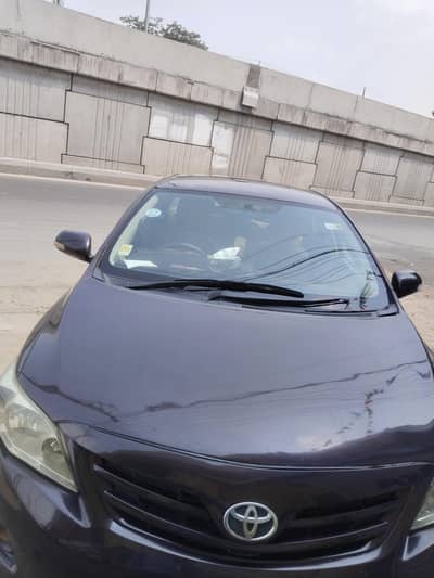 Toyota Corolla GLI 2013 urgent sale kmi beshi ho jaye gi