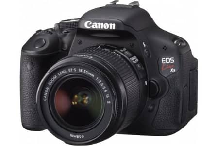 Kiss x5 canon with 50mm lens + bag+ charger