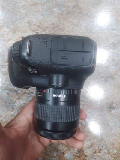 canon 6d body with 35 80 lens