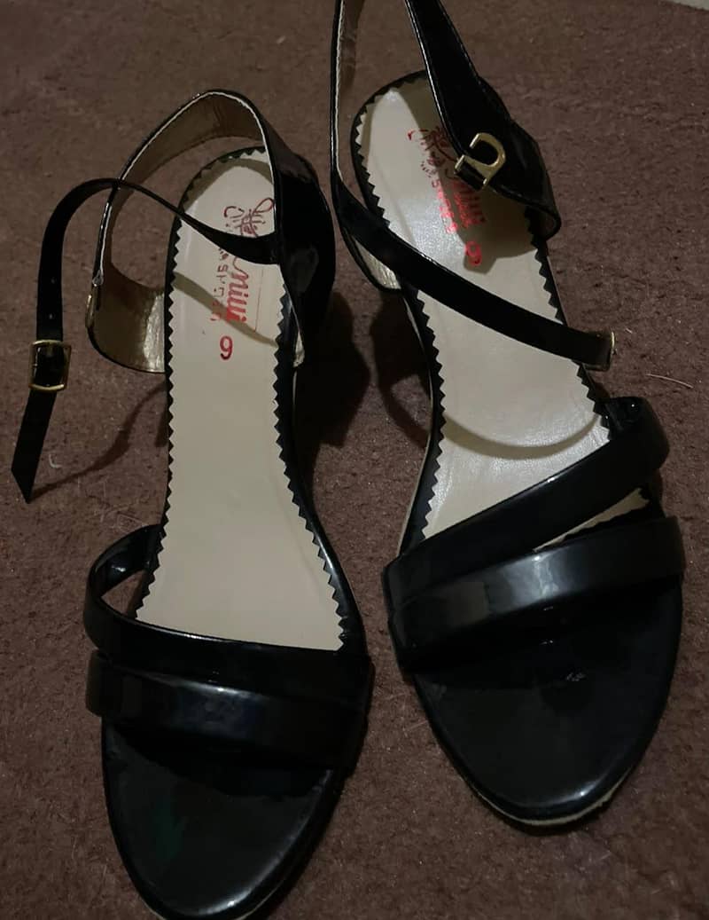 black simple heels. . 1