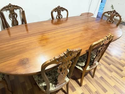 Shesham wood dining table and chairs.
