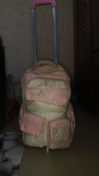 Pink cute trolley bag little bit used.