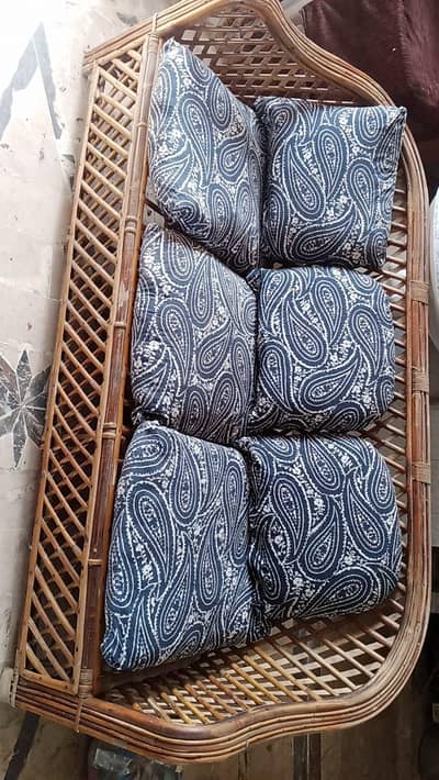 cane sofa