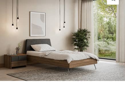Interwood single bed with side table