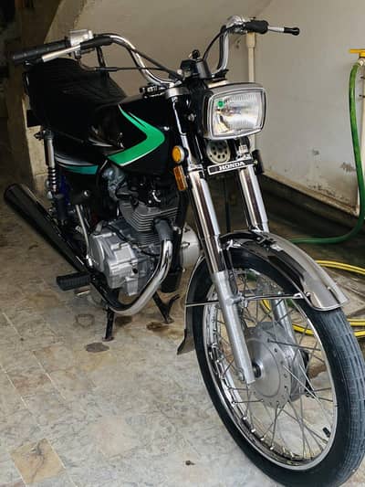 Honda 125 (band silencer)