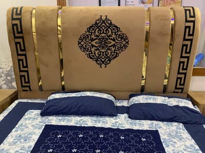 queen bed and two side table