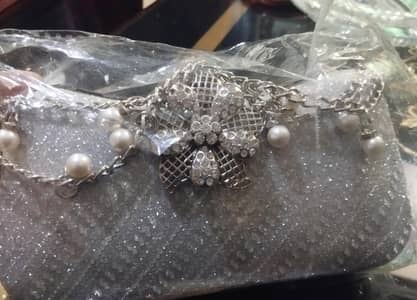 Silver white clutch bag with chain