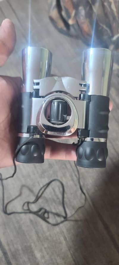 Brand new compact all steel 10*25 binocular-10/10 condition
