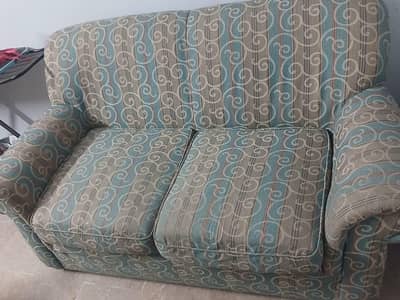 Two seater sofa and table