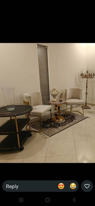 White sofa chairs table