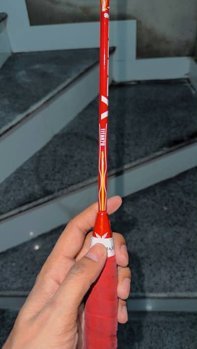 Badminton racket used in 2 or 3 matches by professional player