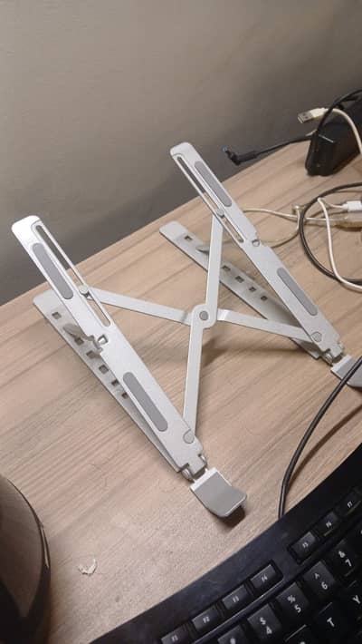 Laptop stand for sale supports all laptops only Rs 1000
