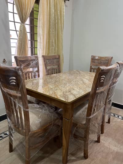Brand new dining table with 6 chairs