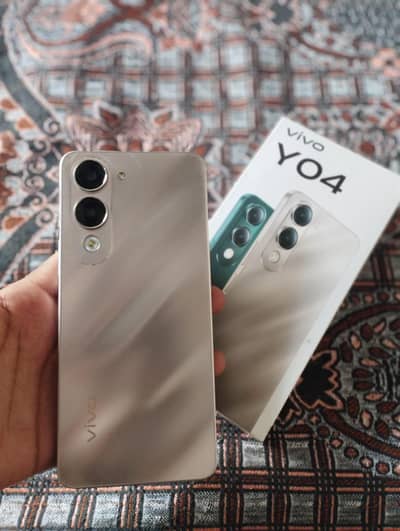 Vivo Y04.4/128GB with box and original charger condition 10/8.5