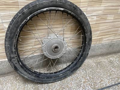 Front tyre and rim