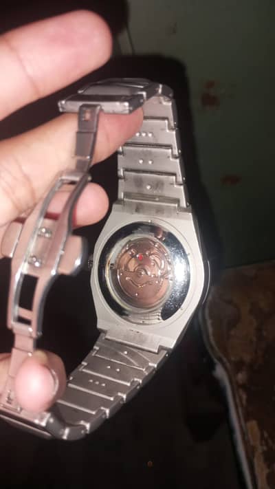 Hublot diomaond cut watch in silver auto watch