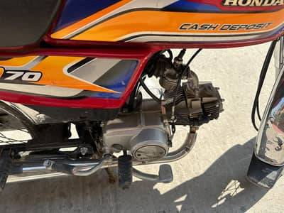 Red Honda CD 70 model 2024 slightly used
