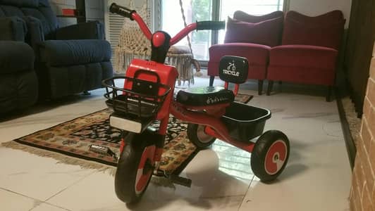 kids tricycle (one time used)