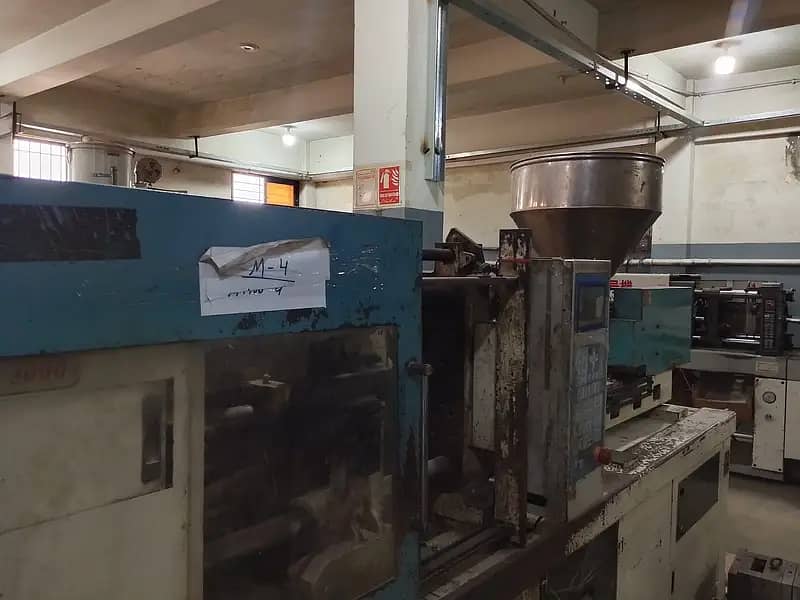 Injection molding machine 12