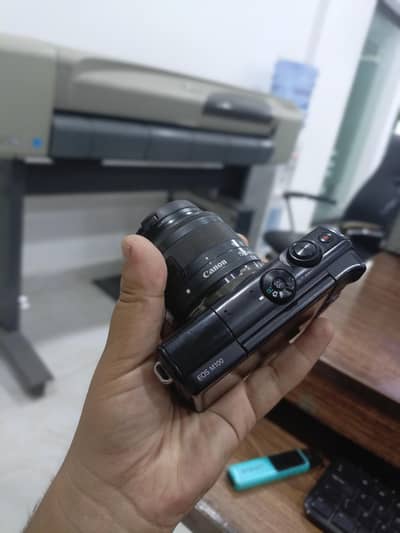 Canon M100