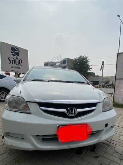 *Specifications:* Model: 2006 Honda City iDSI Color: White Engine: iDS