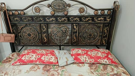 King size bed with mattress.