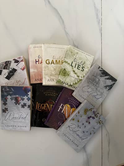 3 twisted series books F1 series Caraval series