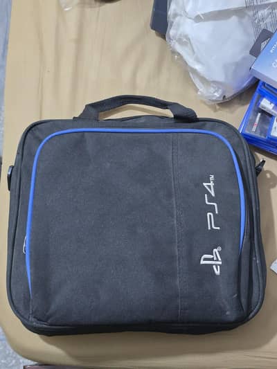 Unused PS4 Bag + Charging Stand & thumb grips