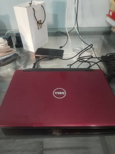 Dell laptop red color working con condition 9/10 r