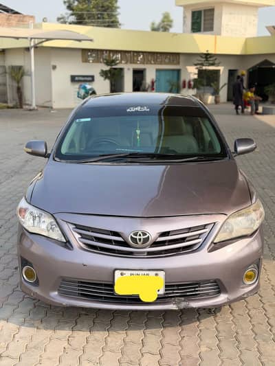 Toyota Corolla GLI 2009 facelift into 14 model urgent sale
