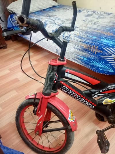 Kids bicycle including training wheels